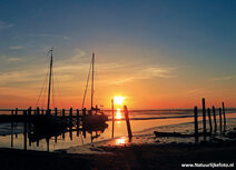 Sunrise Wadden sea with Sailboats postcard Sunrise Wadden sea with Sailboats postcard
